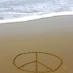 peace sign on beach